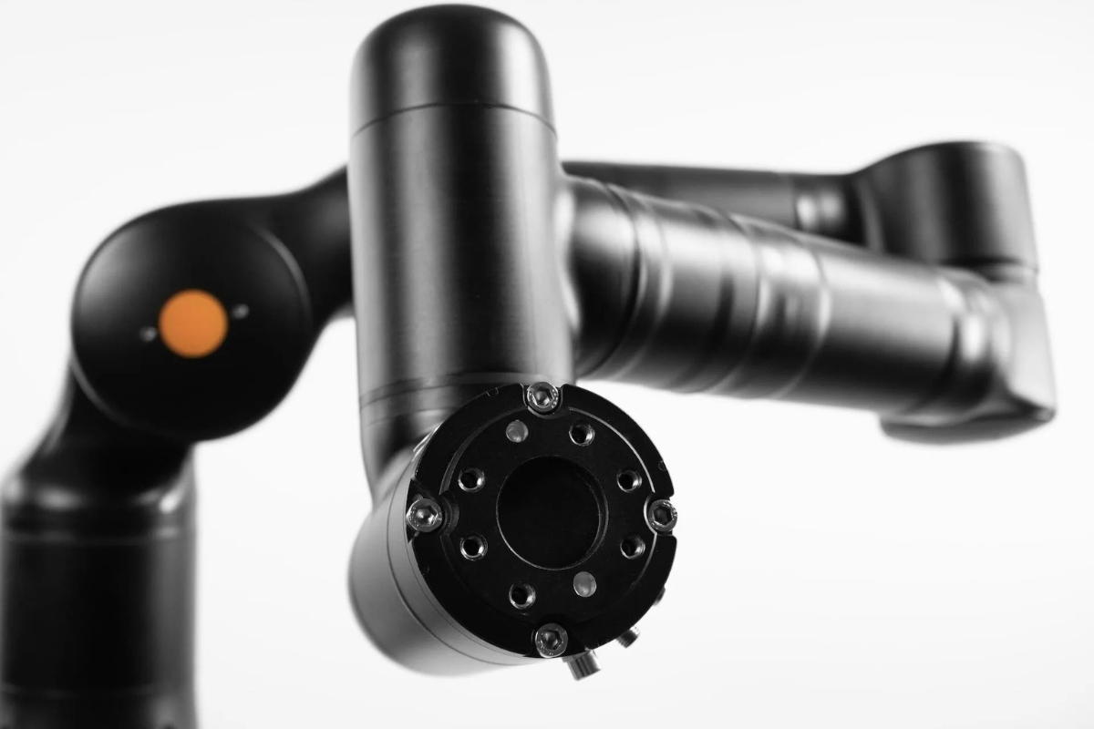 Untitled design (14) Bosch Rexroth NEXO cordless WiFi nutrunner with angle head attachment and ProCORE 18V battery floating above Earth in a dramatic space-themed product marketing image.